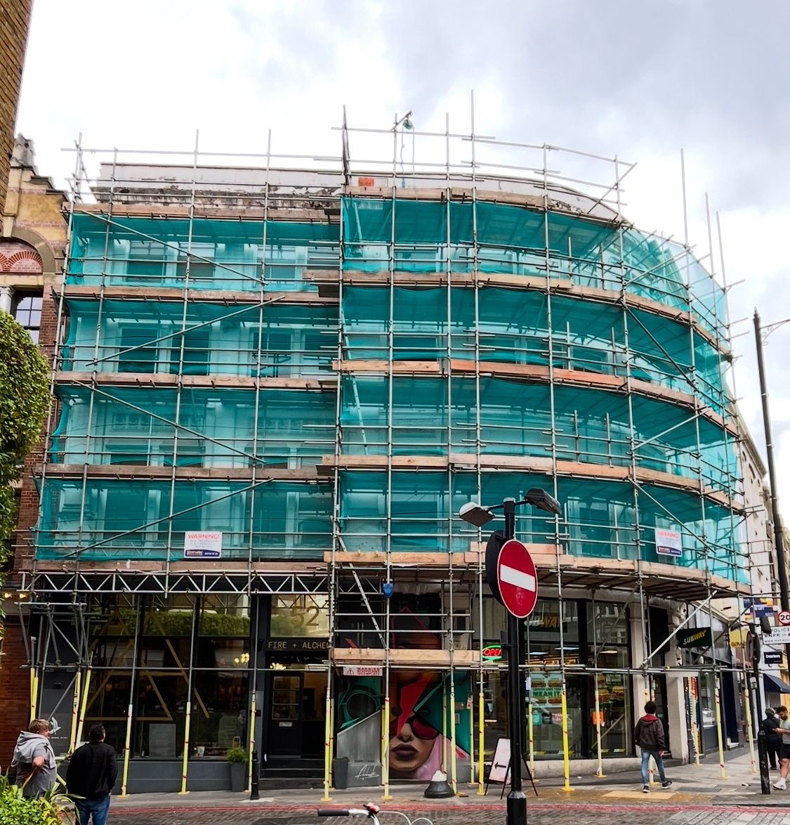 Fully wrapped in debris netting, to lower the risk of anything falling. 