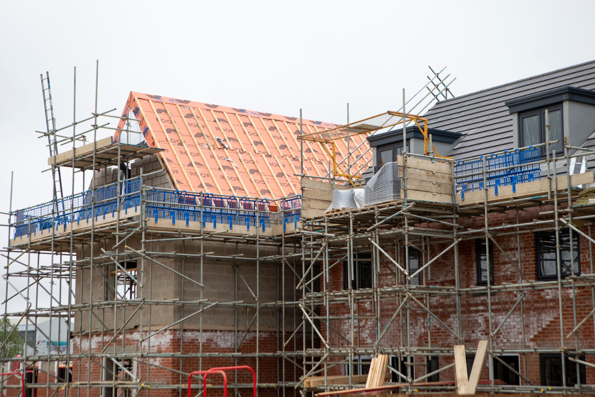 Scaffolding around a new house under construction